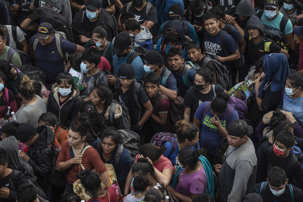 A crowd of migrants
