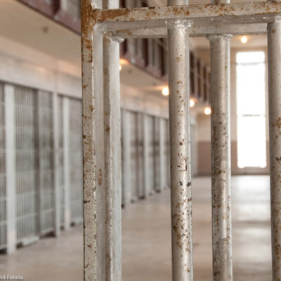 A photo of prison bars.
