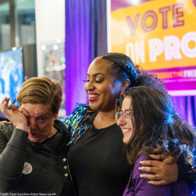 Proposal 3 supporters celebrate on Election Day in Detroit.