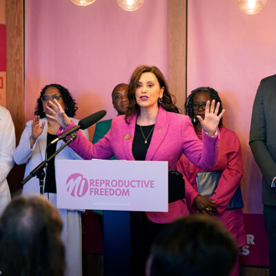 Governor Gretchen Whitmer speaking to a room of people.