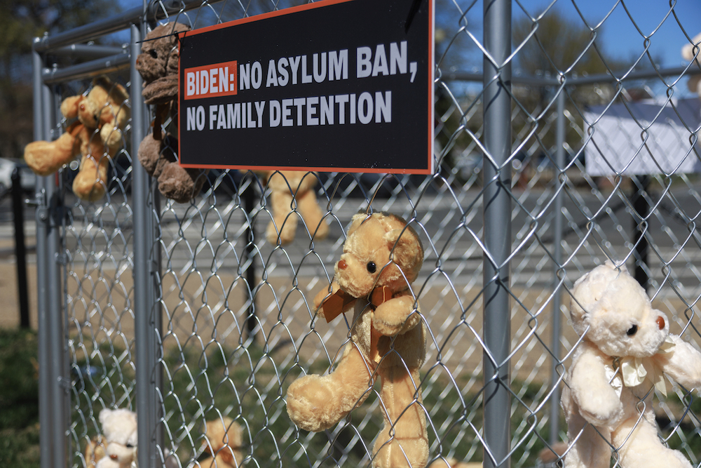 Stuffed animals are placed in cages behind a fence, as part of a protest organized by the ACLU, the We Are All America organization and the Women's Refugee Commission, near the White House in Washington, D.C.