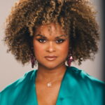 Headshot of activist and author Raquel Willis with a neutral expression