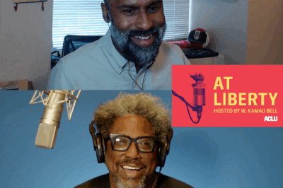 Picture of podcast host W. Kamau Bell interviewing a guest